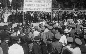 Rally in support of the Bolsheviks in Petrograd . Banner: "All power to the Council! Down with capitalist ministers! June, 1917. Sputnik